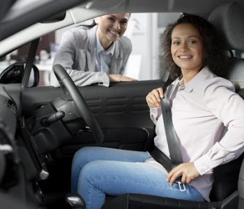 women-fastening-seatbelt