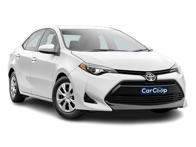 White Toyota Corolla parked against a plain white background, showcasing its sleek design and color